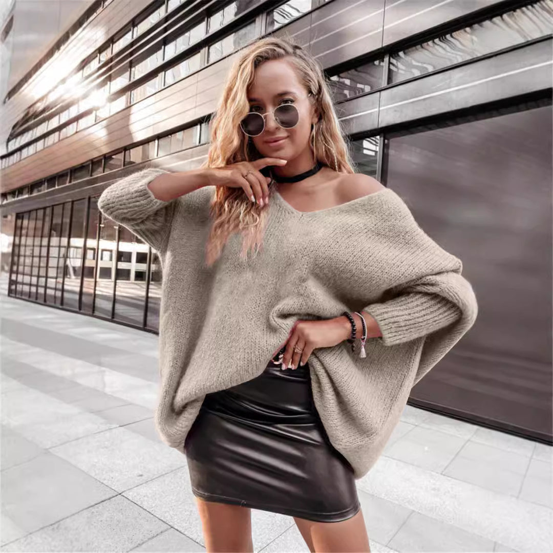 Dame Oversized Strikpullover med asymmetrisk design og afslappet snit Stilla