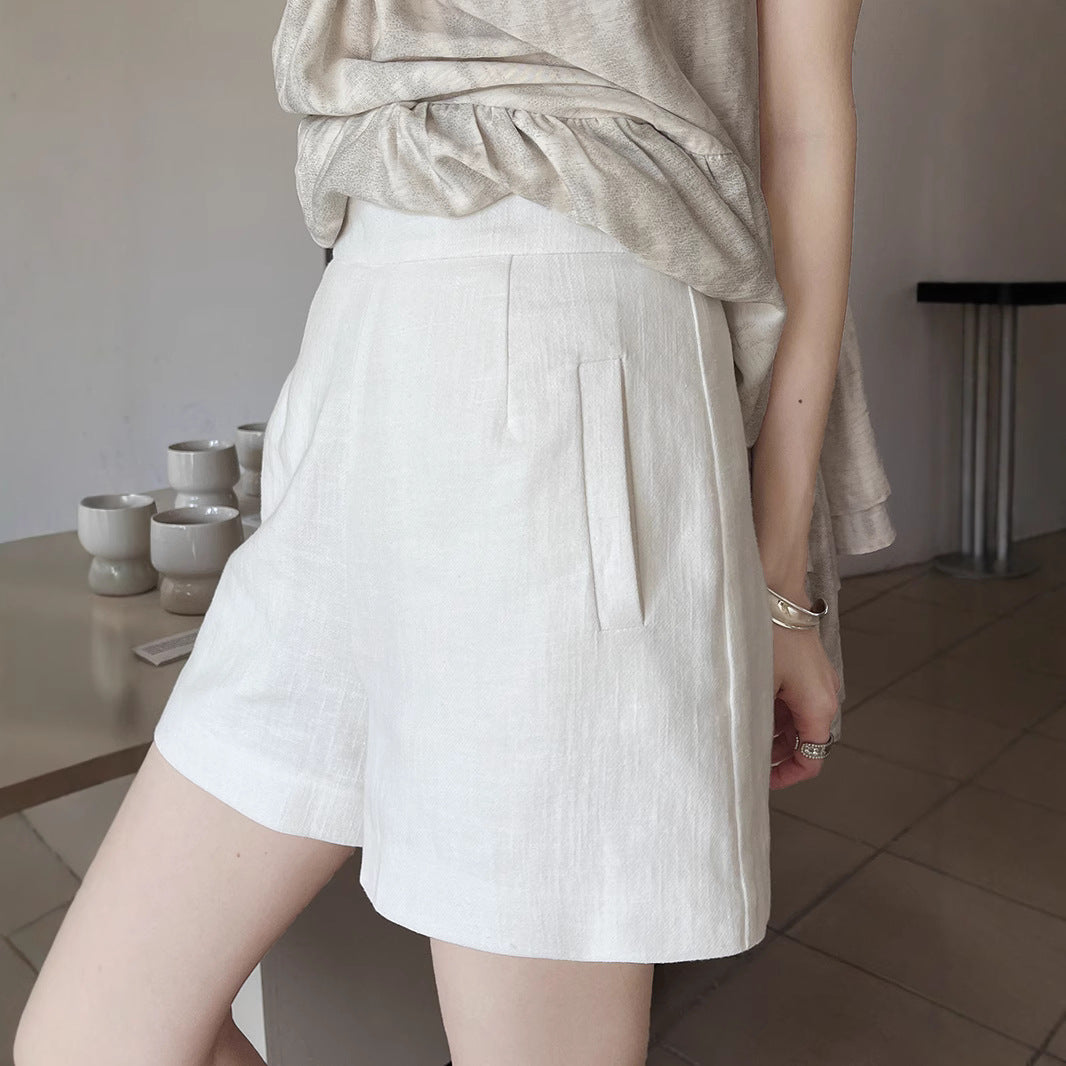 Dame elegante shorts i minimalistisk stil med høj talje og praktiske lommer Stilla
