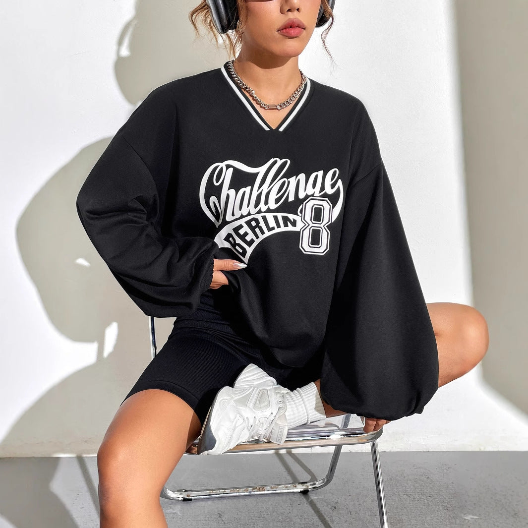Kvinders afslappede oversized sweatshirt med V-hals og grafisk tryk Stilla