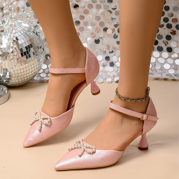 Dame elegante pumps med glimmerdetaljer og dekorativ sløjfe Stilla