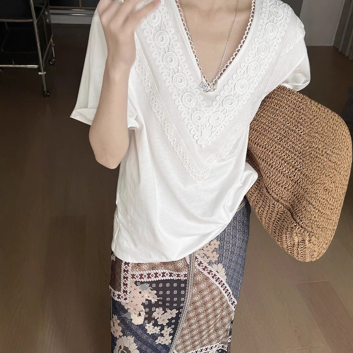 Dame elegant T-shirt med fine spidsede accenter og ensfarvet design Stilla