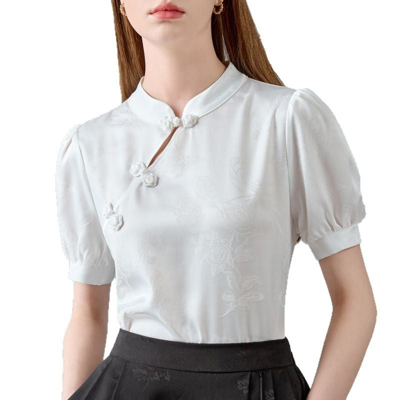 Damebluse med puffærmer og dekorative knapper Stilla