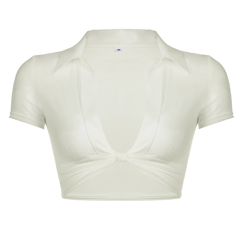 Damen cropped Oberteil mit tiefem V-Ausschnitt und zarter Knotendetailierung Skovae