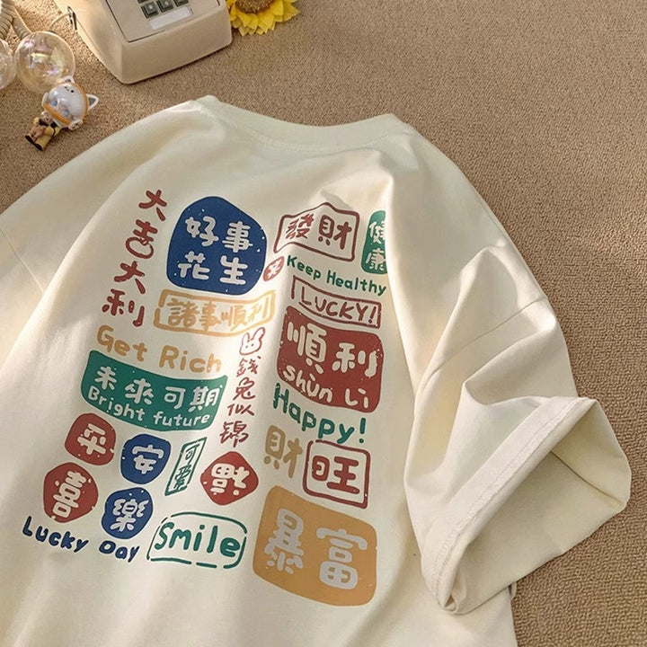 Dame T-Shirt med kreativ tekst og afslappet snit Stilla
