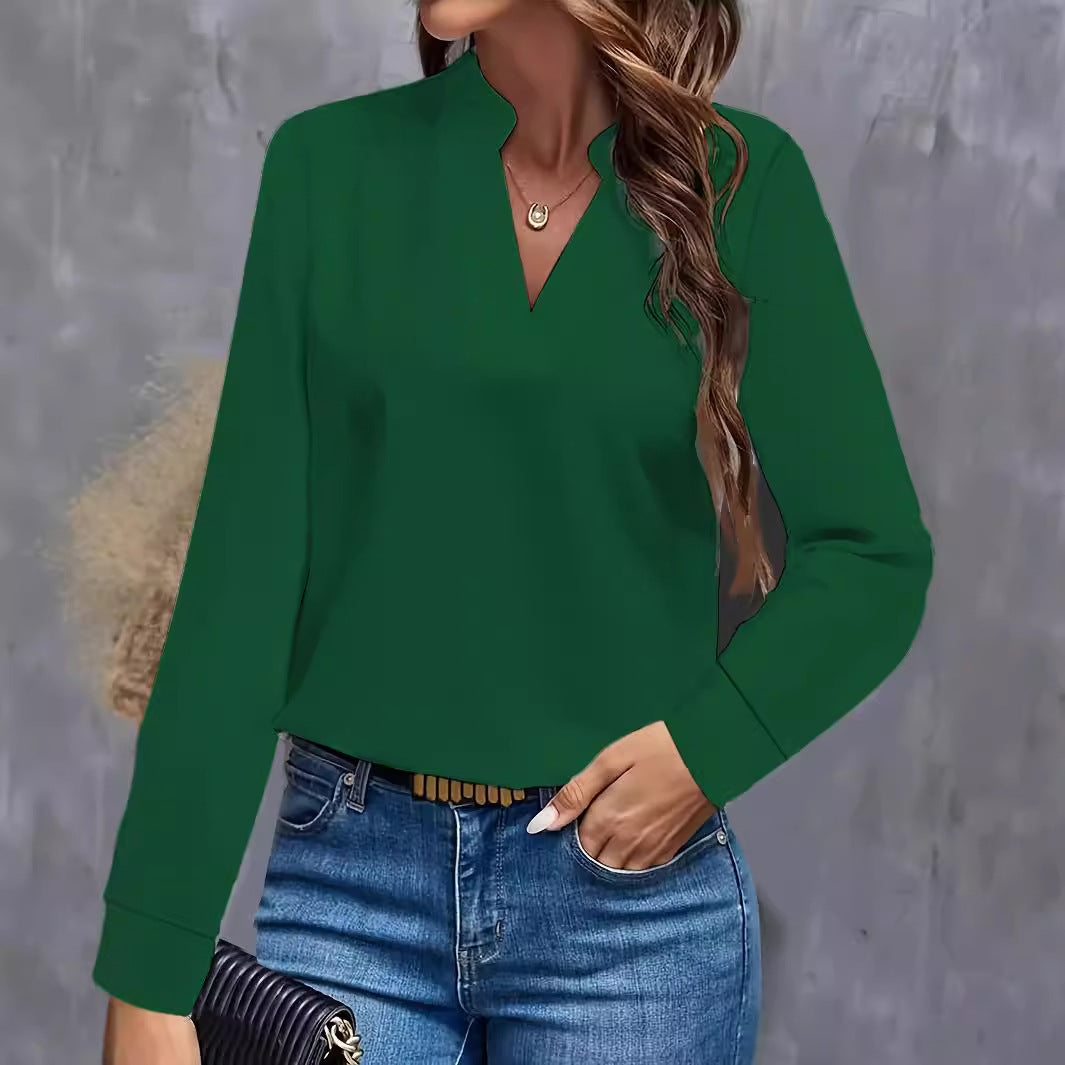 Dame elegant bluse i minimalistisk design med dekorativ V-udskæring og lange ærmer Stilla