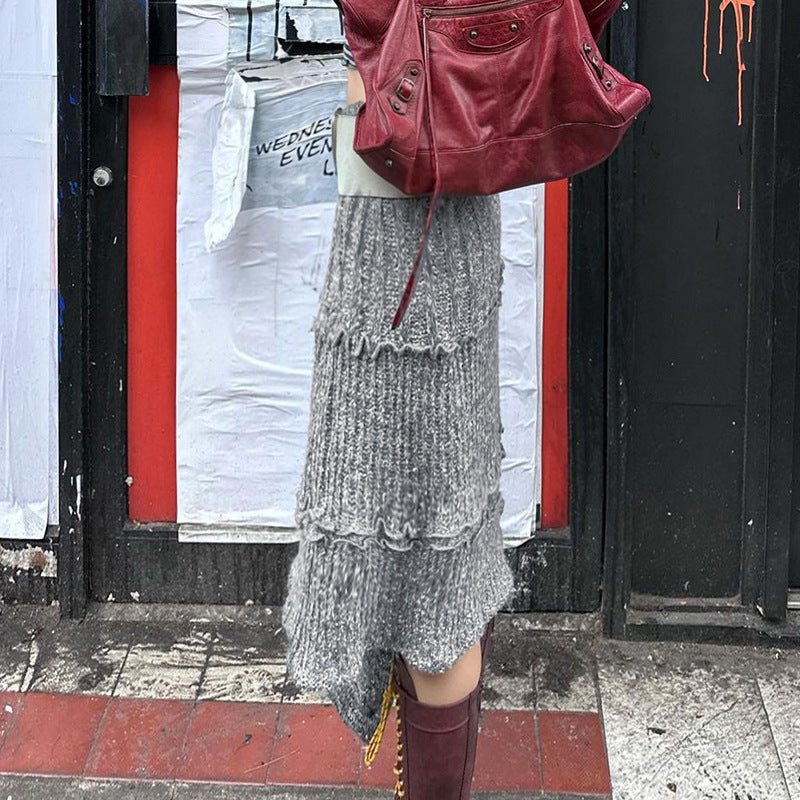Dame asymmetrisk strikjakke med fashionable ribdetaljer og binde detaljer Skovae