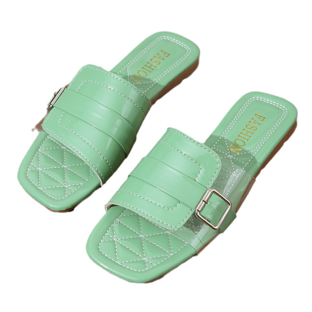 Dame slide-sandaler med gennemsigtig rem og moderne kædeforbindelse Stilla