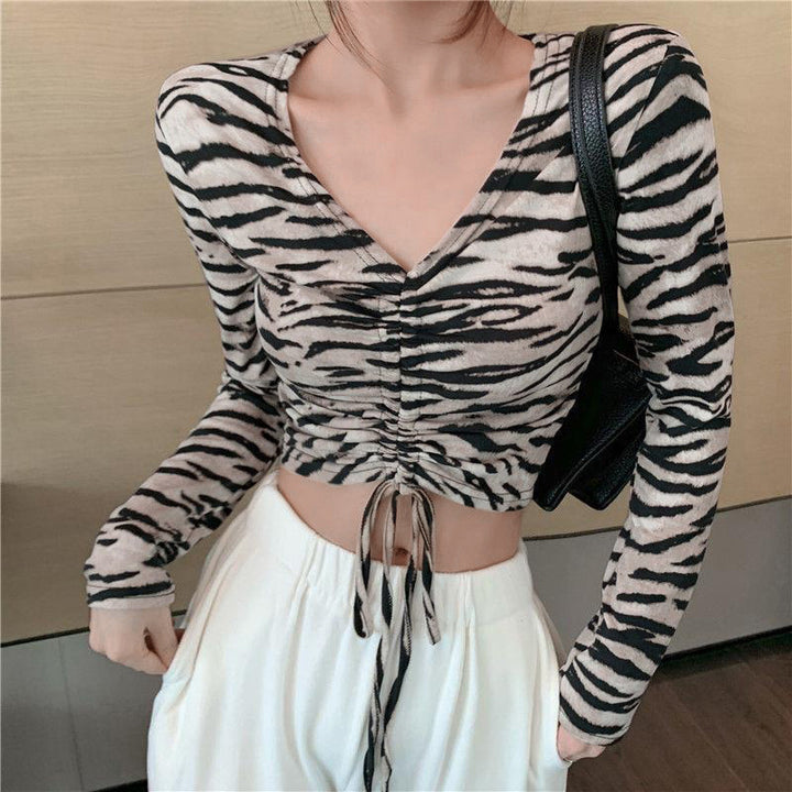 Kvindernes figur-fremhævende crop top med smalle lange ærmer Stilla