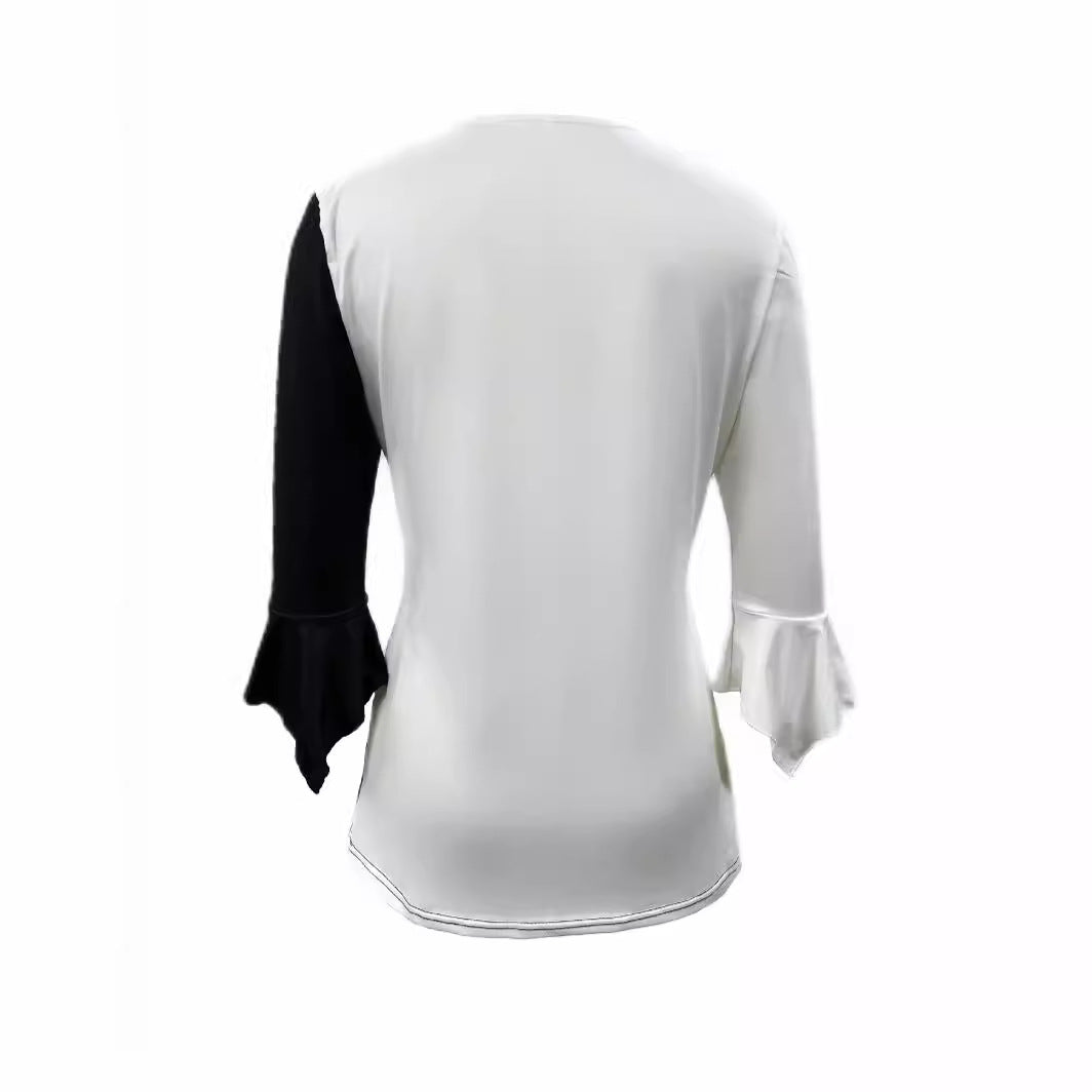 Damebluse med florale accenter og V-udskæring Stilla