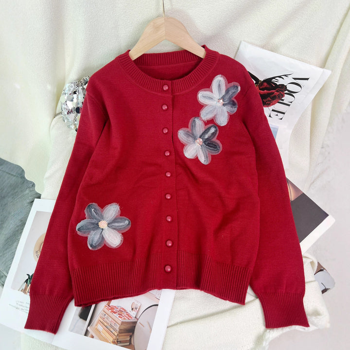 Dame cardigan med blomsterdesign og knaplukning Stilla
