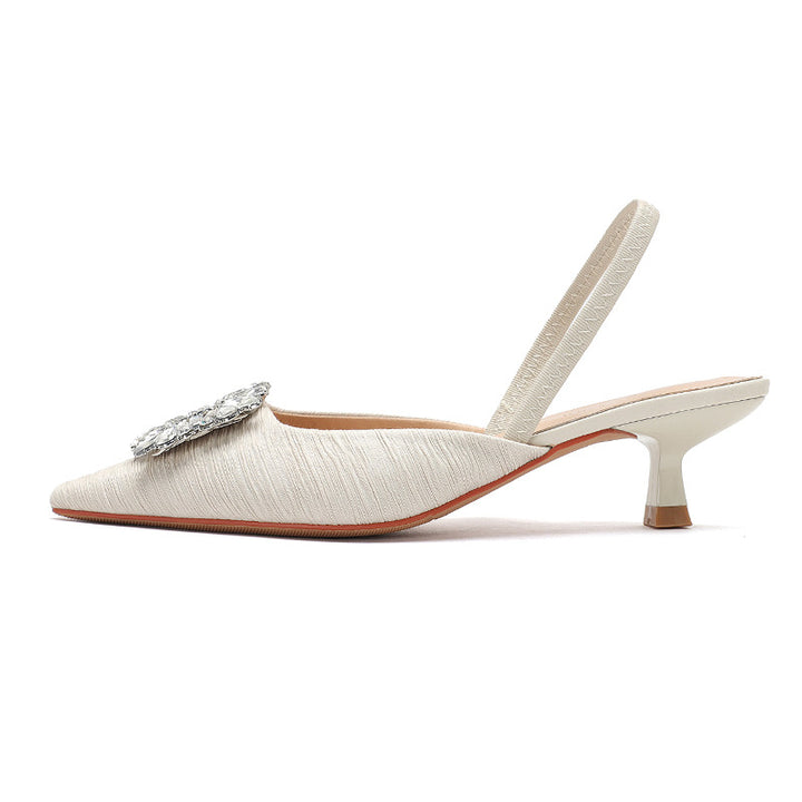 Femme Elegante Slingback-hæle med dekorativt blomsterdetalje Stilla