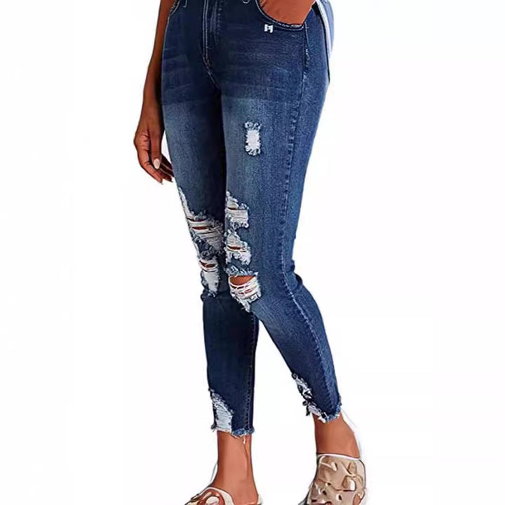 Dame Skinny Jeans med modetrend Destroyed-effekt og figurskærende snit Stilla