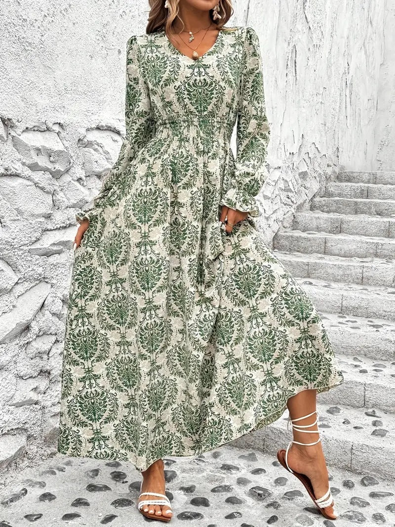 Dame Maxikjole med floralt design og vidde skørt Stilla