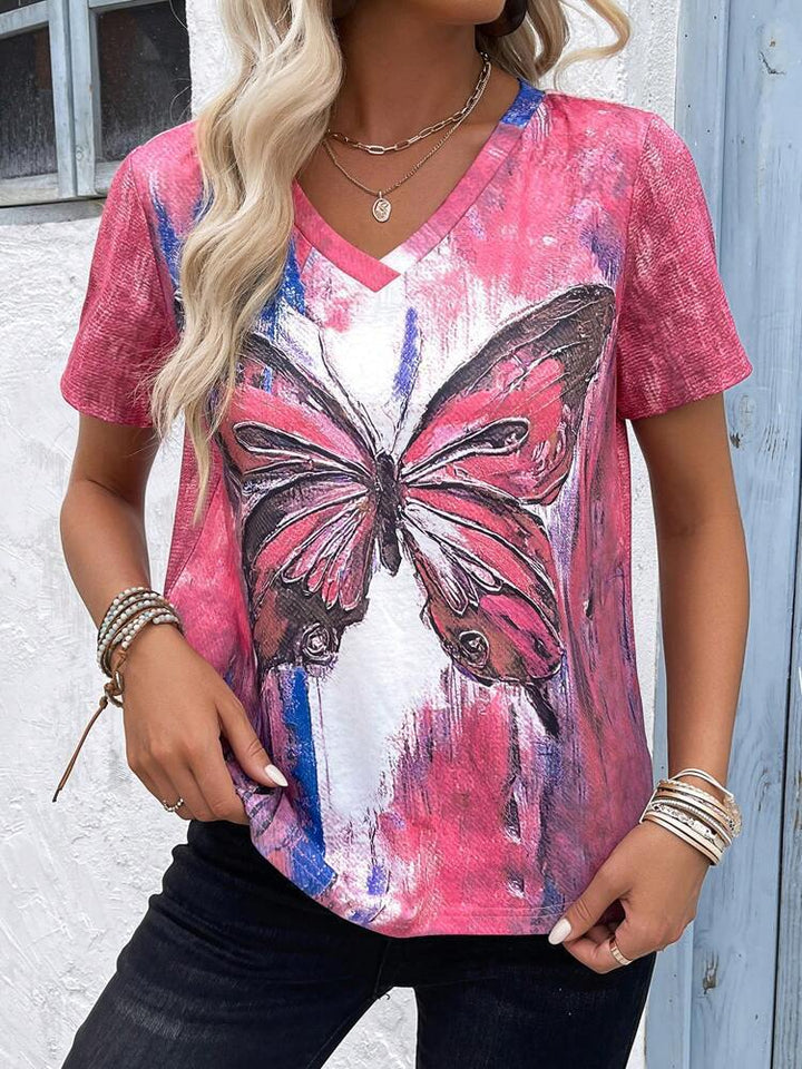 Dame V-hals T-shirt med kunstnerisk sommerfugletryk og afslappet pasform Stilla