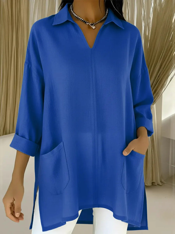 Dame Langærmet bluse med elegant V-hals og praktiske lommer Skovae