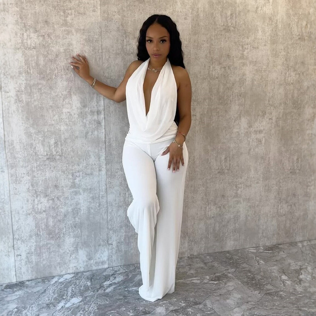 Dame Jumpsuit med elegant indpakningsdetalje og brede benpartier Skovae