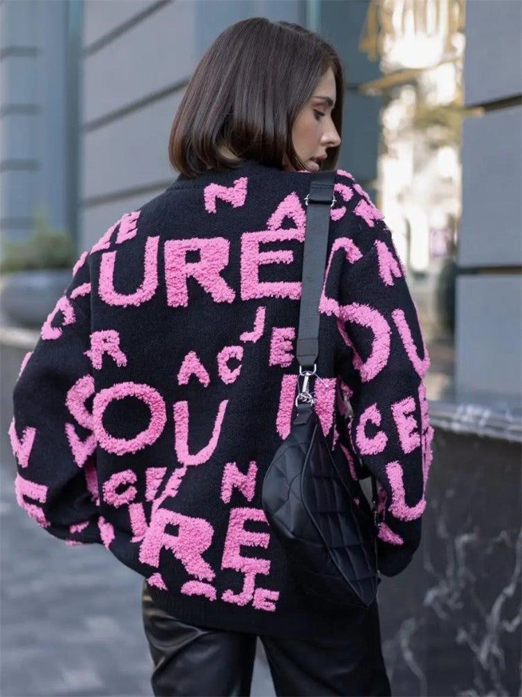 Dame Oversized Strikpullover med iøjnefaldende skrift og afslappet pasform Stilla