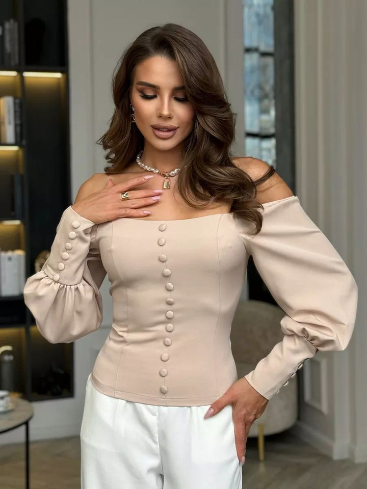 Dame Off-Shoulder Bluse med elegante puffærmer og knapdetaljer Stilla