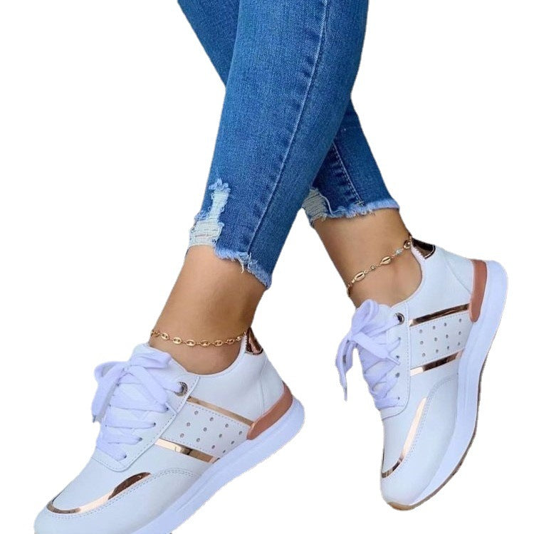 Dame mode Sneakers med en elegant glansfinish og åndbar overfladestruktur Stilla