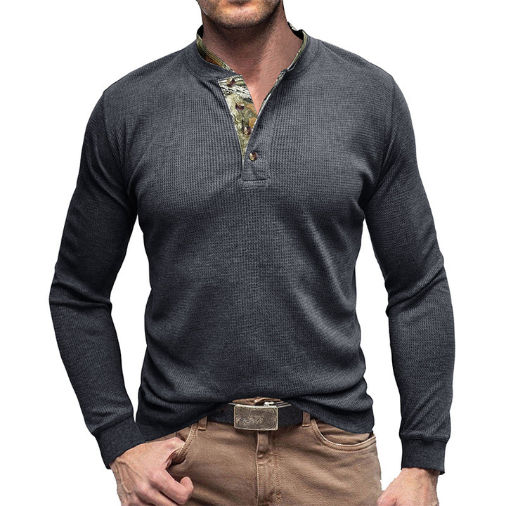 Herrer stilfuld langærmet Henley-shirt med struktureret design og elegant knaplukning Stilla