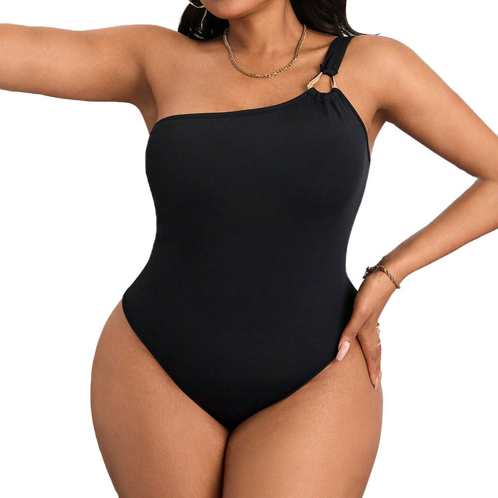 Dame one-piece badedragt med asymmetrisk design og raffineret skulderdetalje Skovae