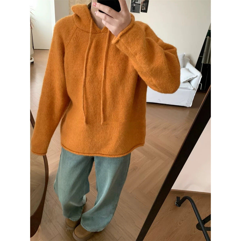Kvinders hyggelige hætte sweatshirt lavet af blødt fleece-materiale med kengurulomme Stilla