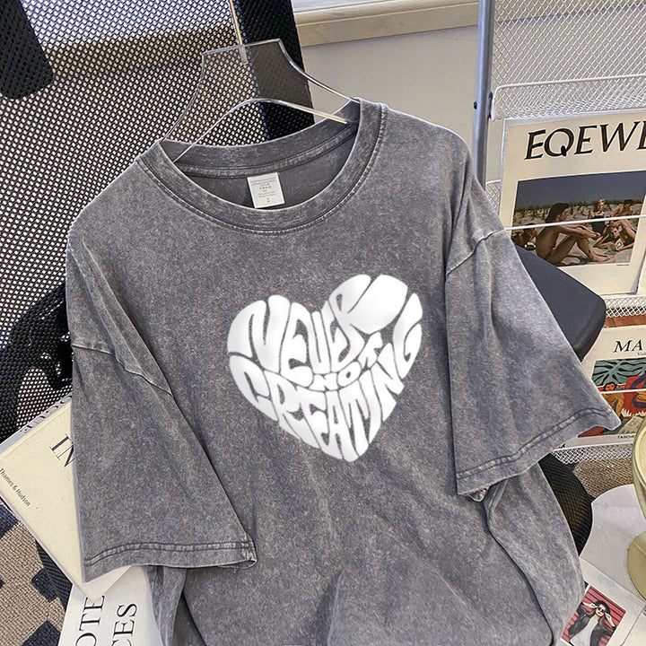 Dame Oversized T-shirt med kreativt hjerte-motiv og afslappet skrifttype Stilla