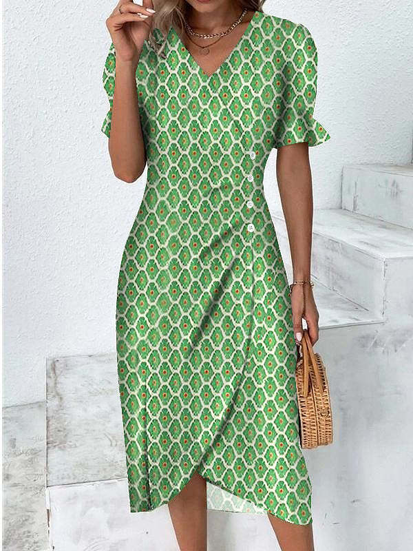 Dame wrapkjole med floral design og elegante knapdetaljer Stilla