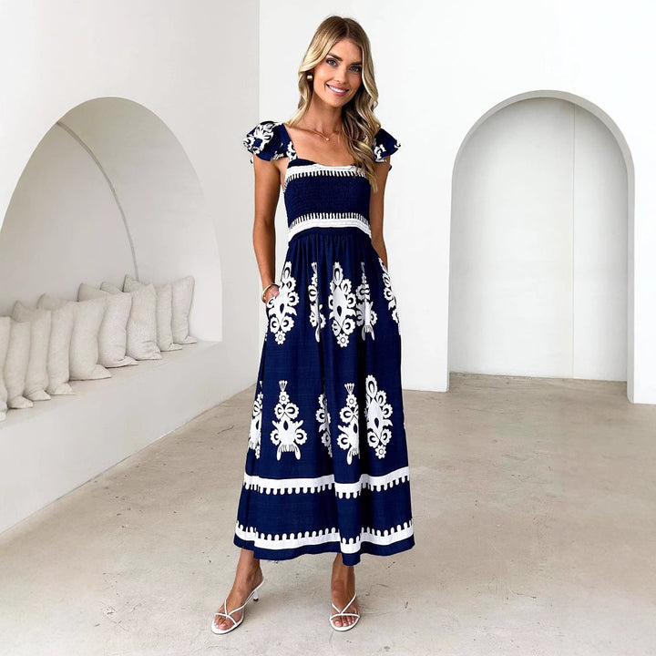 Kvindernes maxikjole med off-shoulder design og blomster mønstre Stilla