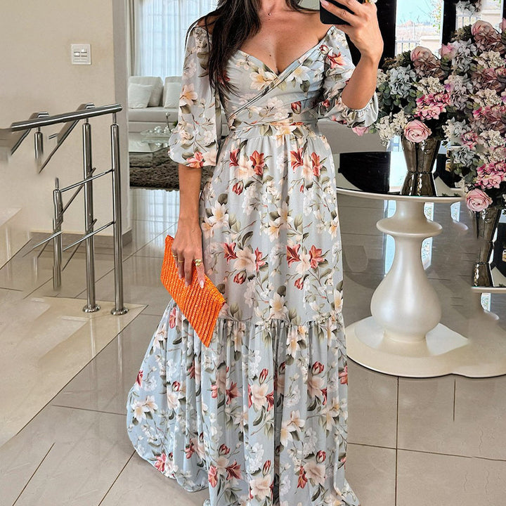 Kvinders blomster maxi kjole med off-shoulder design og flæse kant Stilla