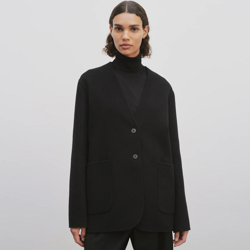 Kvinders elegante strikket blazer med store revers og praktiske lommer Stilla