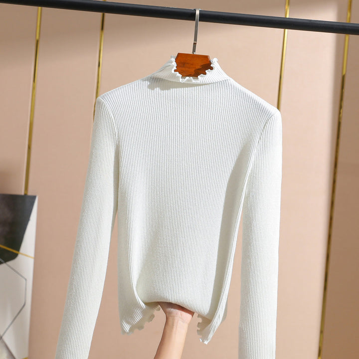 Dame rullekrave sweater med fin ribstruktur og elegante afslutninger Stilla
