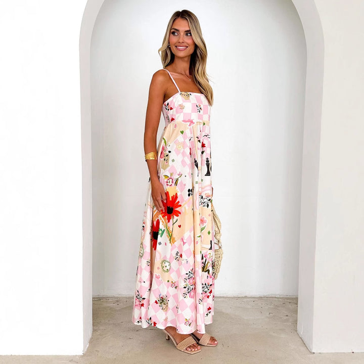 Dame maxikjole med elegant blomstret design og svajende skørt Stilla