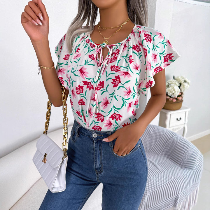 Damebluse med blomsterprint og elastiske ærmer Stilla