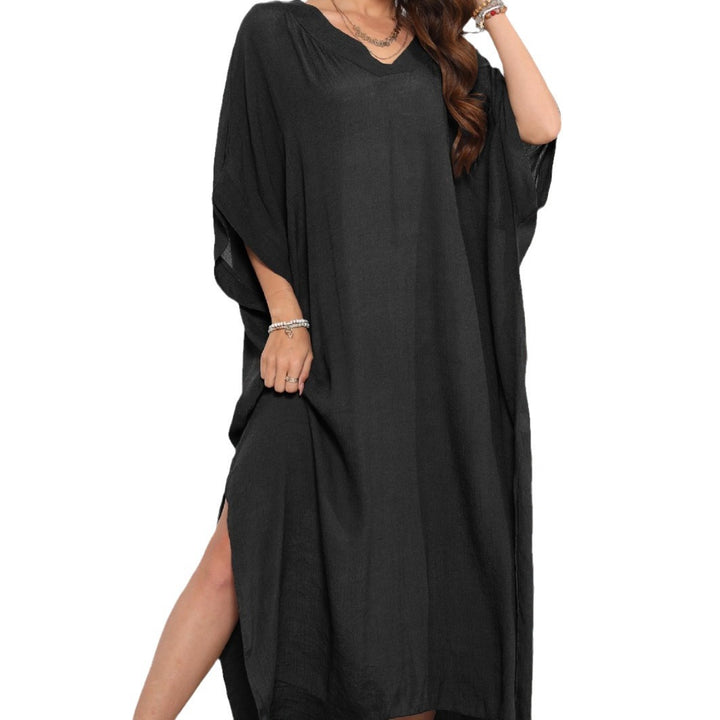 Dame Kaftan i afslappet oversized stil med dyb V-udskæring og sidelæg Stilla