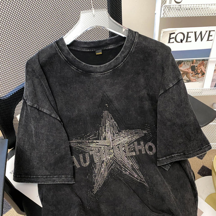 Dame T-shirt med funklende stjernemotiv og afslappet pasform Stilla