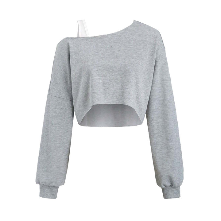 Kvindernes cropped sweatshirt med asymmetrisk design og voluminøse ærmer Stilla