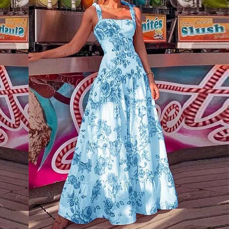 Dame Maxikjole med romantisk blomsterprint og svajende skirt Stilla