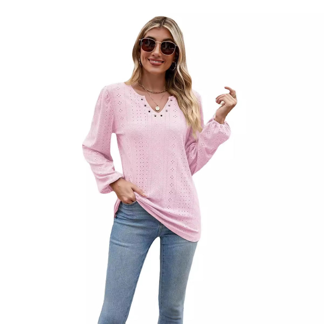 Damebluse med elegant spidsstruktur og V-hals Stilla
