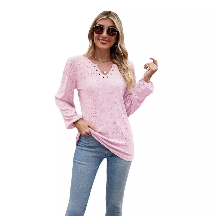 Damebluse med elegant spidsstruktur og V-hals Stilla