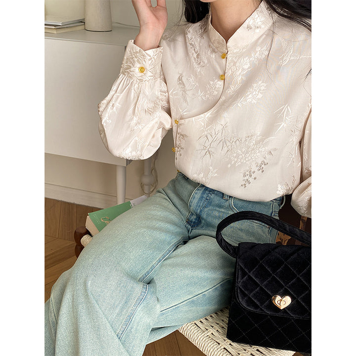 Damebluse med blomsterbroderi og fine knapdetaljer Stilla