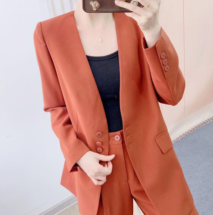Dame elegant blazer med moderne knapdetaljer og struktureret tekstur Stilla
