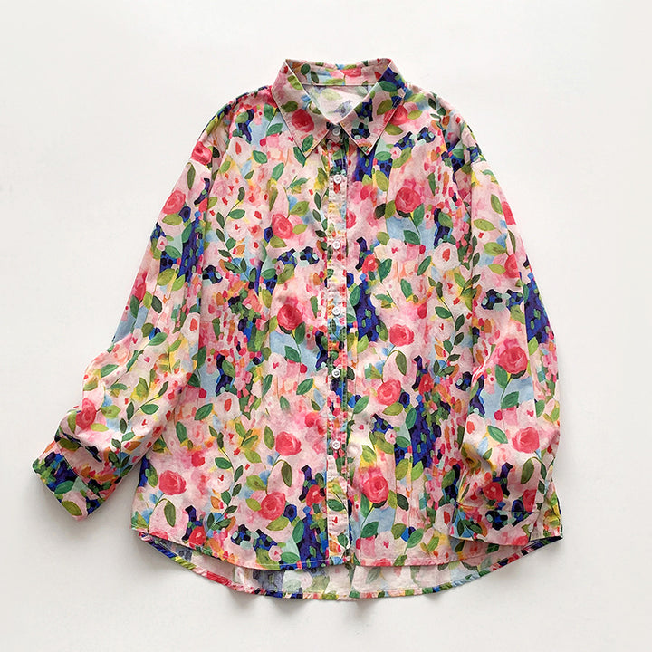 Damebluse med farverigt blomstermønster og løst fit Stilla
