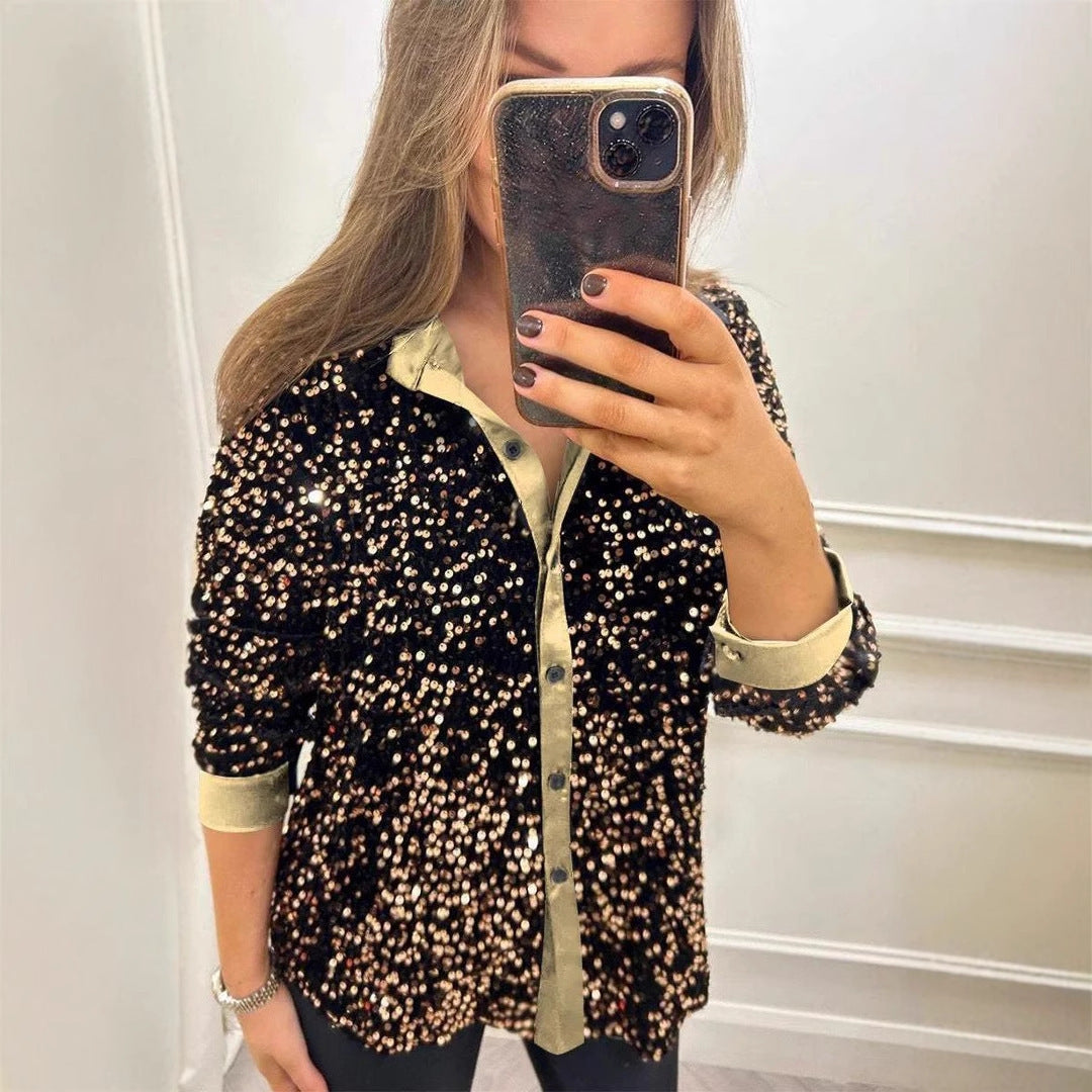 Dame glitrende bluse med elegant knaplukning og luksuriøst design Stiila