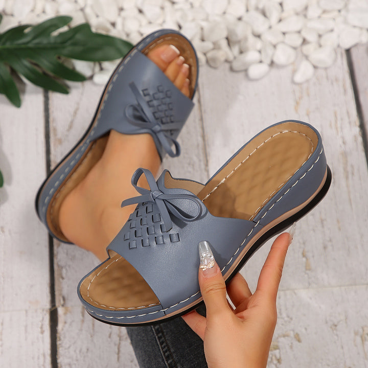 Dame Slide-sandaler med flettet overdel og dekorativt sløjfeaccent Stilla