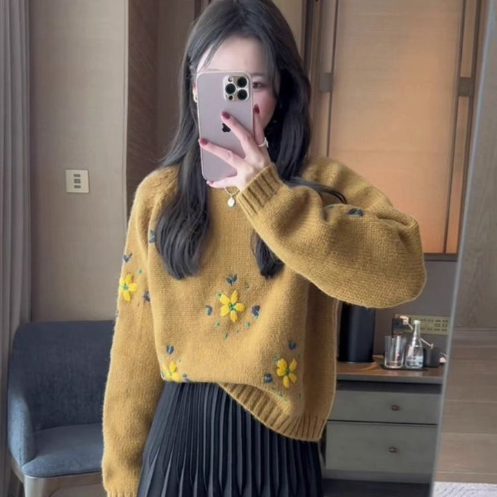 Kvinders strikket sweater med blomsterapplikationer Stilla