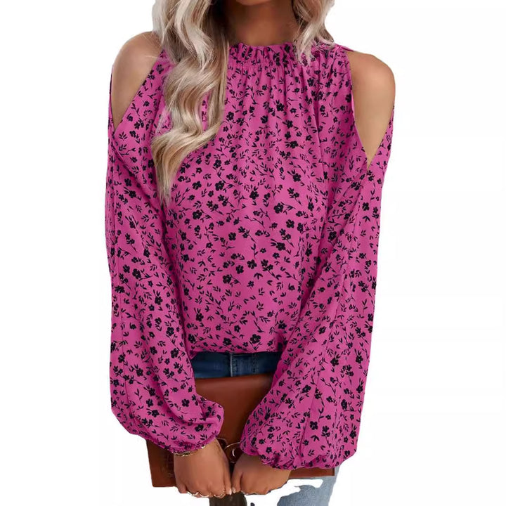 Damebluse i elegant cold-shoulder-design med florale accenter Stilla