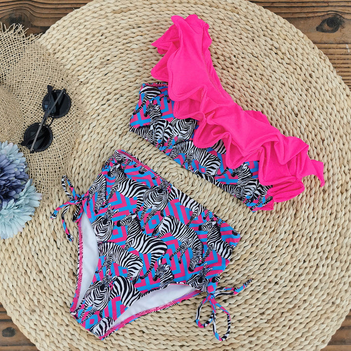 Dame bikini-sæt med voluminøse flæsedetaljer og trendy zebra-mønster Stilla