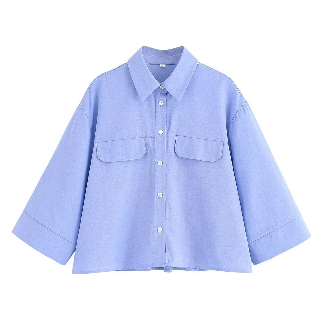 Dame stribet bluse med oversized pasform og praktiske lommer Stilla