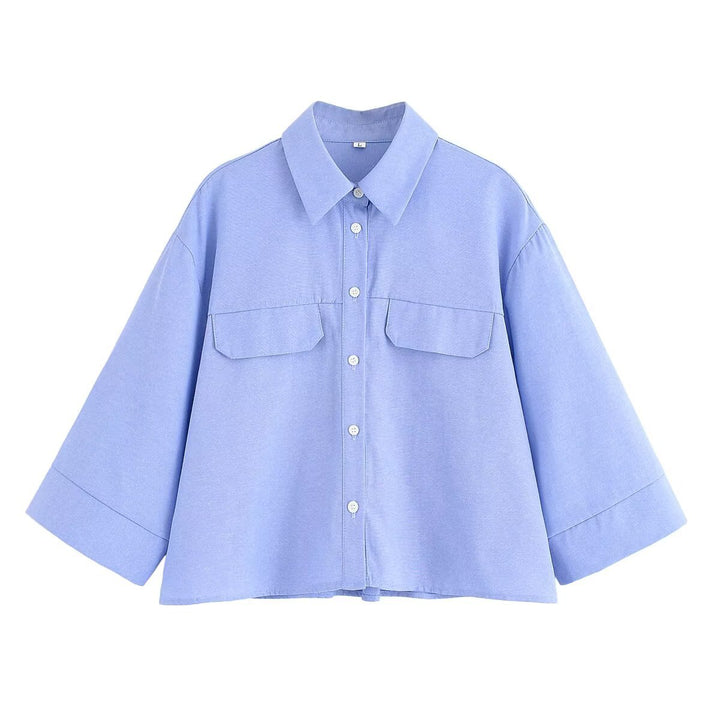 Dame stribet bluse med oversized pasform og praktiske lommer Stilla